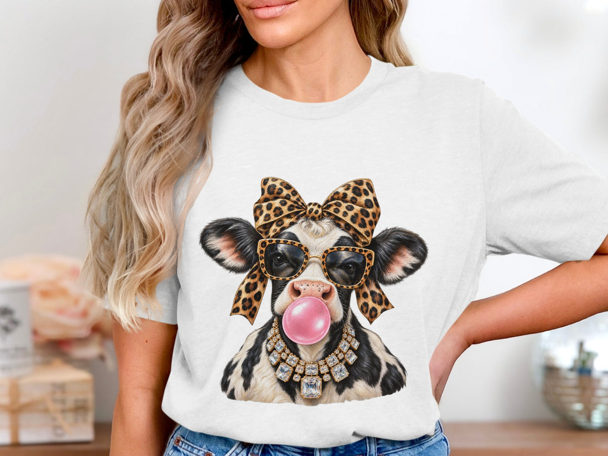 Cow wearing sunglasses, leopard bow, and diamond necklace, blowing pink bubblegum.