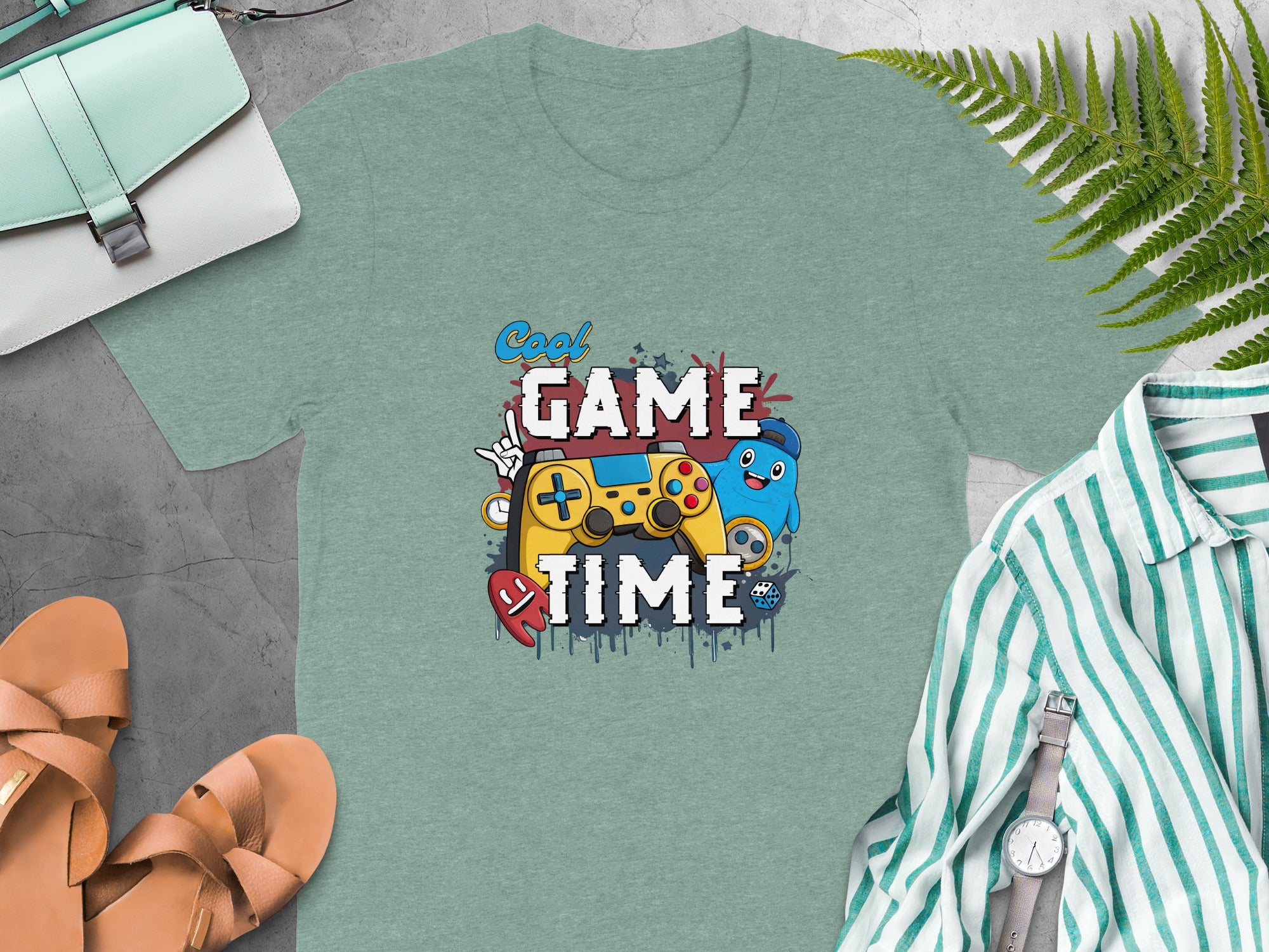 T-shirt with "Cool Game Time" text, video game controller and cartoon characters.