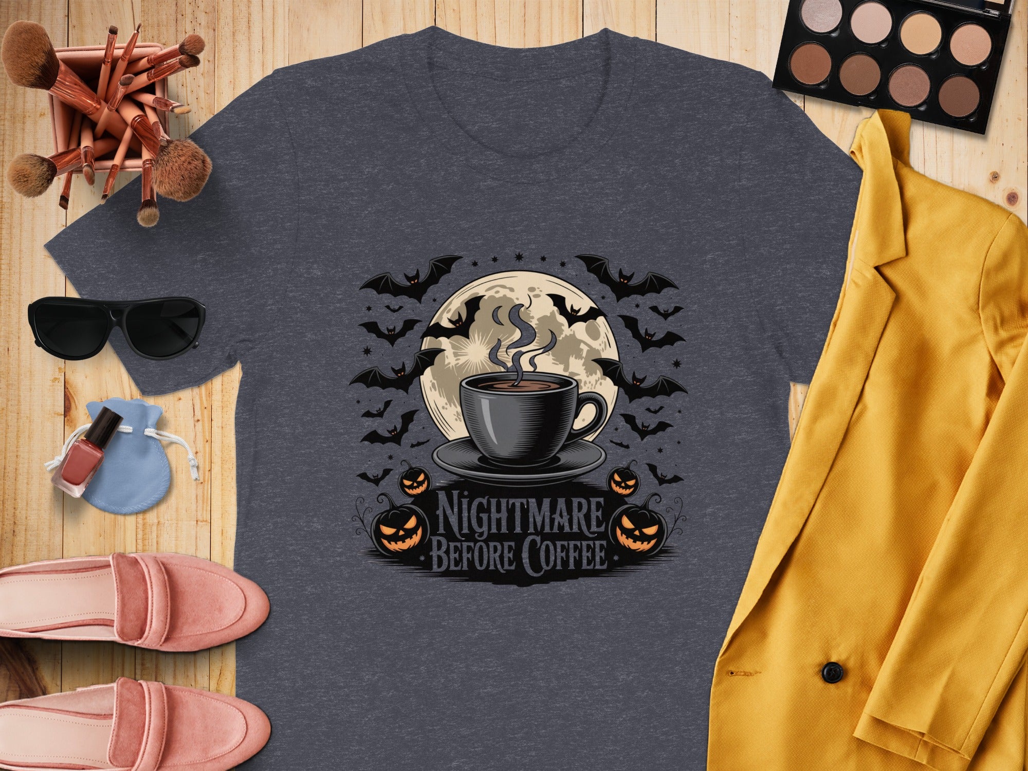 Dark grey t-shirt with "Nightmare Before Coffee" graphic featuring bats, moon, and pumpkins.