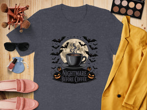 Dark grey t-shirt with "Nightmare Before Coffee" graphic featuring bats, moon, and pumpkins.
