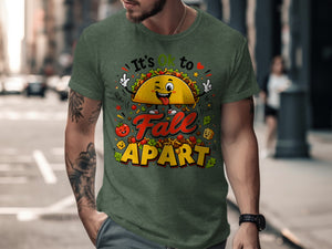 T-shirt graphic with cartoon taco saying "It's Ok to Fall Apart".