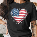 Black t-shirt with an American flag heart graphic and decorative stars.