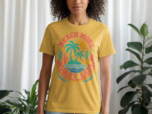 Yellow t-shirt with text "BEACH MORE WORRY LESS" and tropical graphic.
