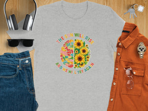 Gray t-shirt with "The Sun Will Rise" and sunflowers on the front.
