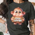 Cartoon monkey holding a wooden sign that says "FOOD LOVER".
