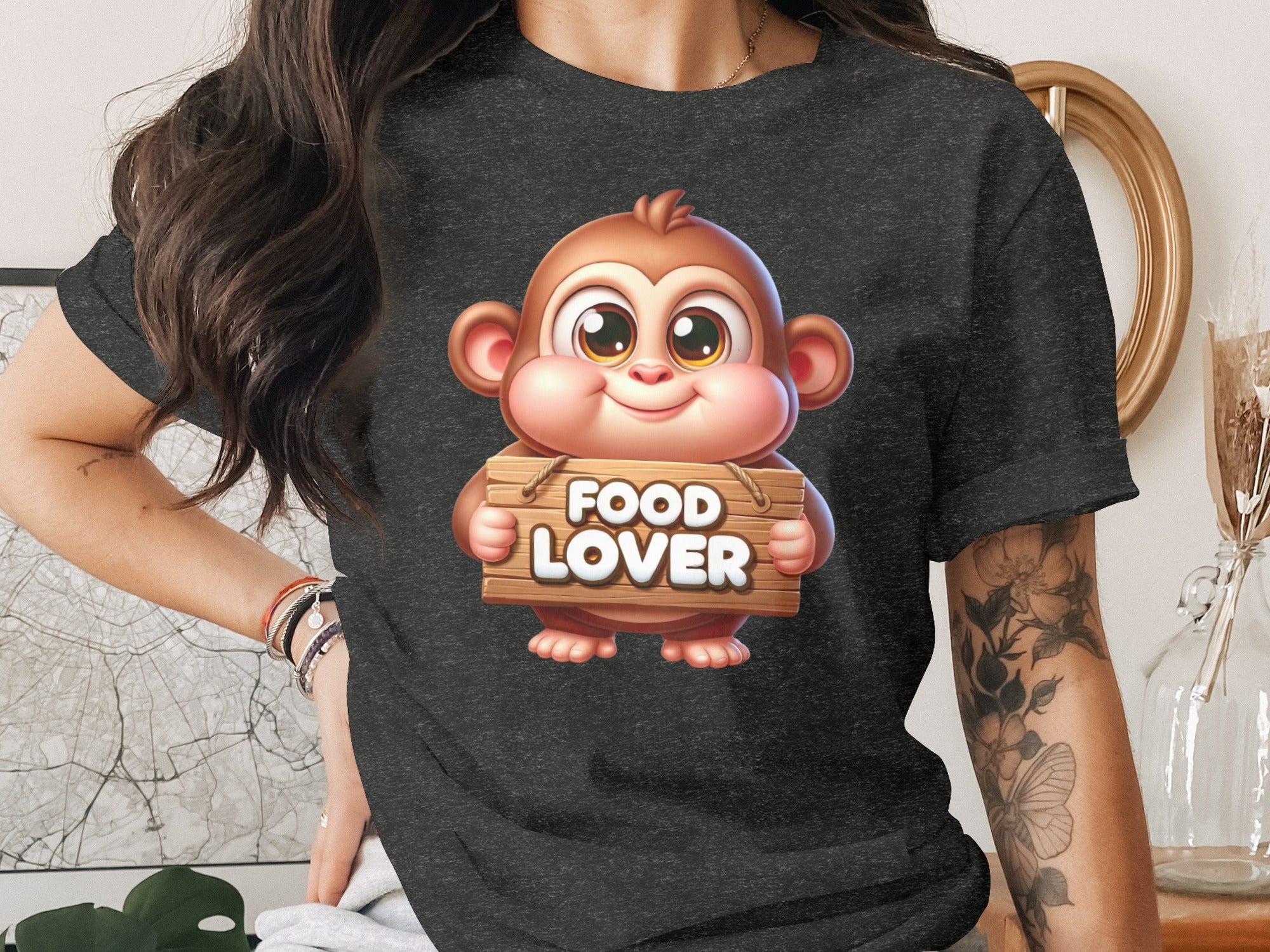 Cartoon monkey holding a wooden sign that says "FOOD LOVER".