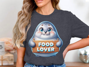 Cute seal holding a wooden sign that says "Food Lover"