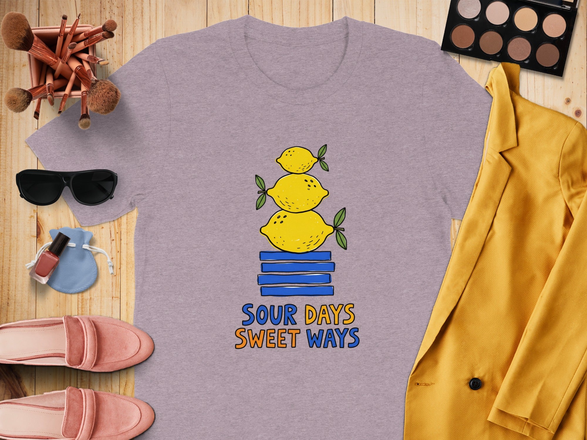 Grey t-shirt with stacked lemons graphic and text "SOUR DAYS SWEET WAYS".