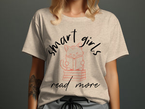 T-shirt graphic: cat reading on books, "smart girls read more"