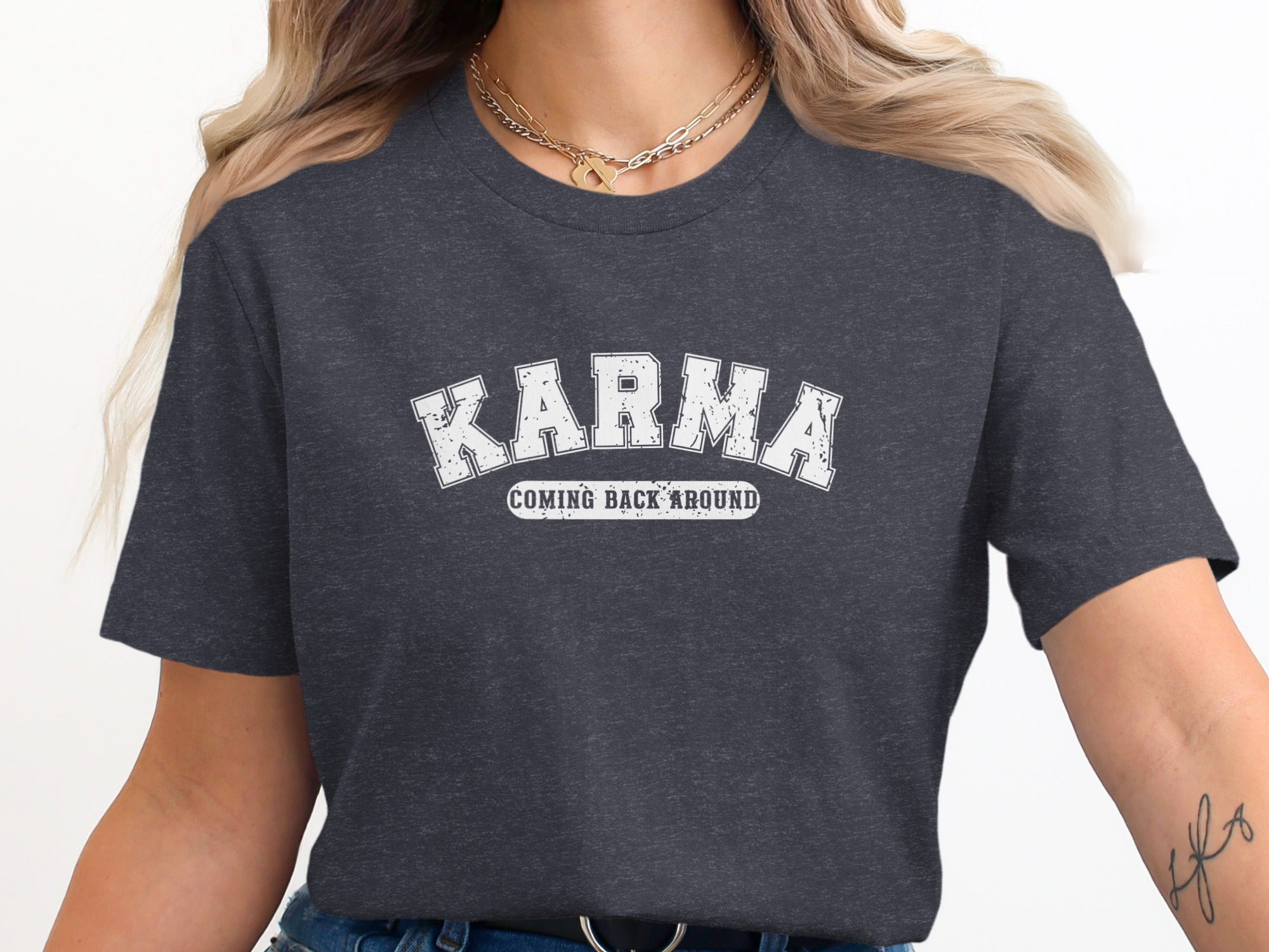 Dark gray t-shirt with white text "KARMA COMING BACK AROUND."