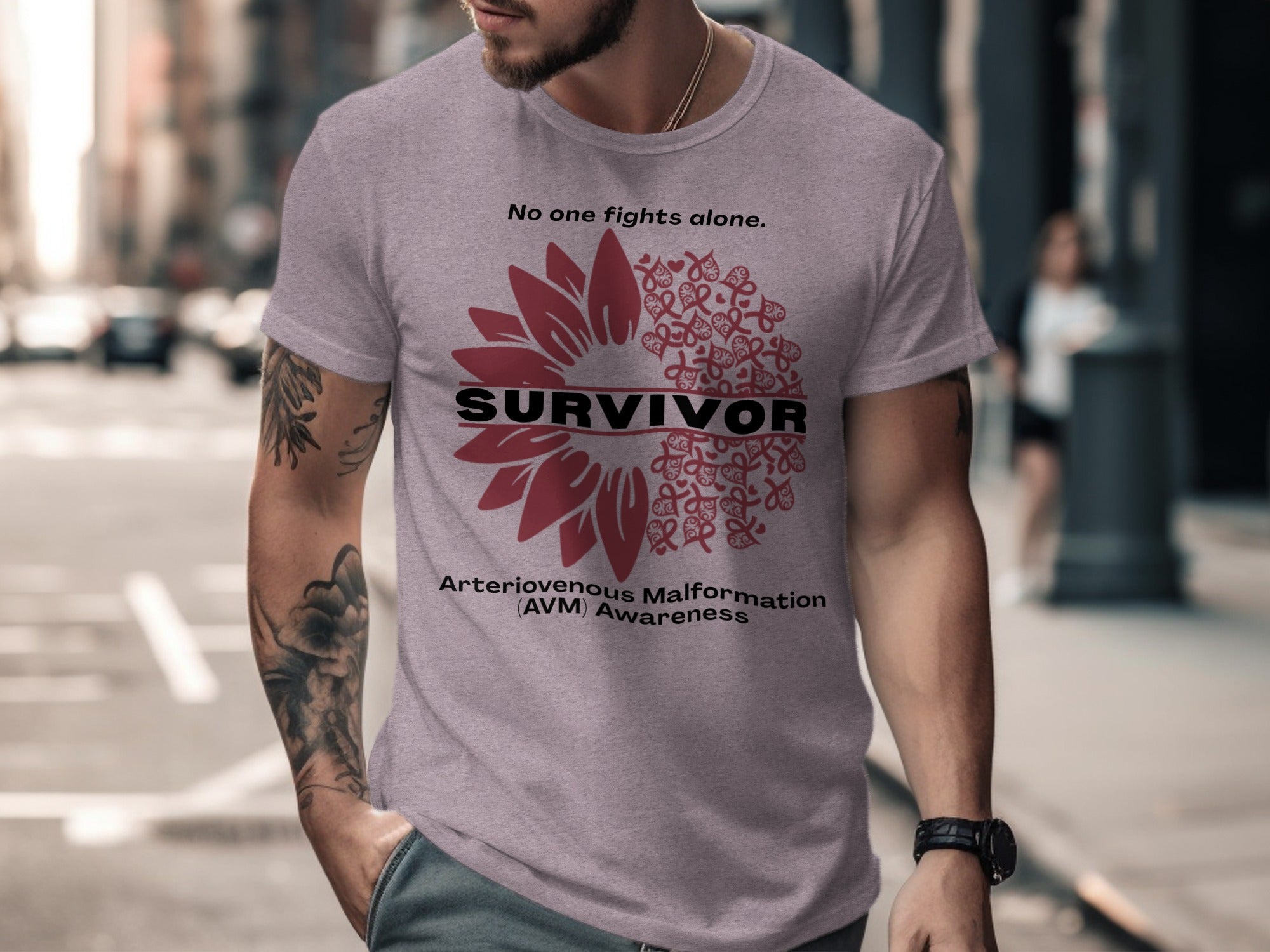 Gray t-shirt with "Survivor" and Arteriovenous Malformation Awareness design.