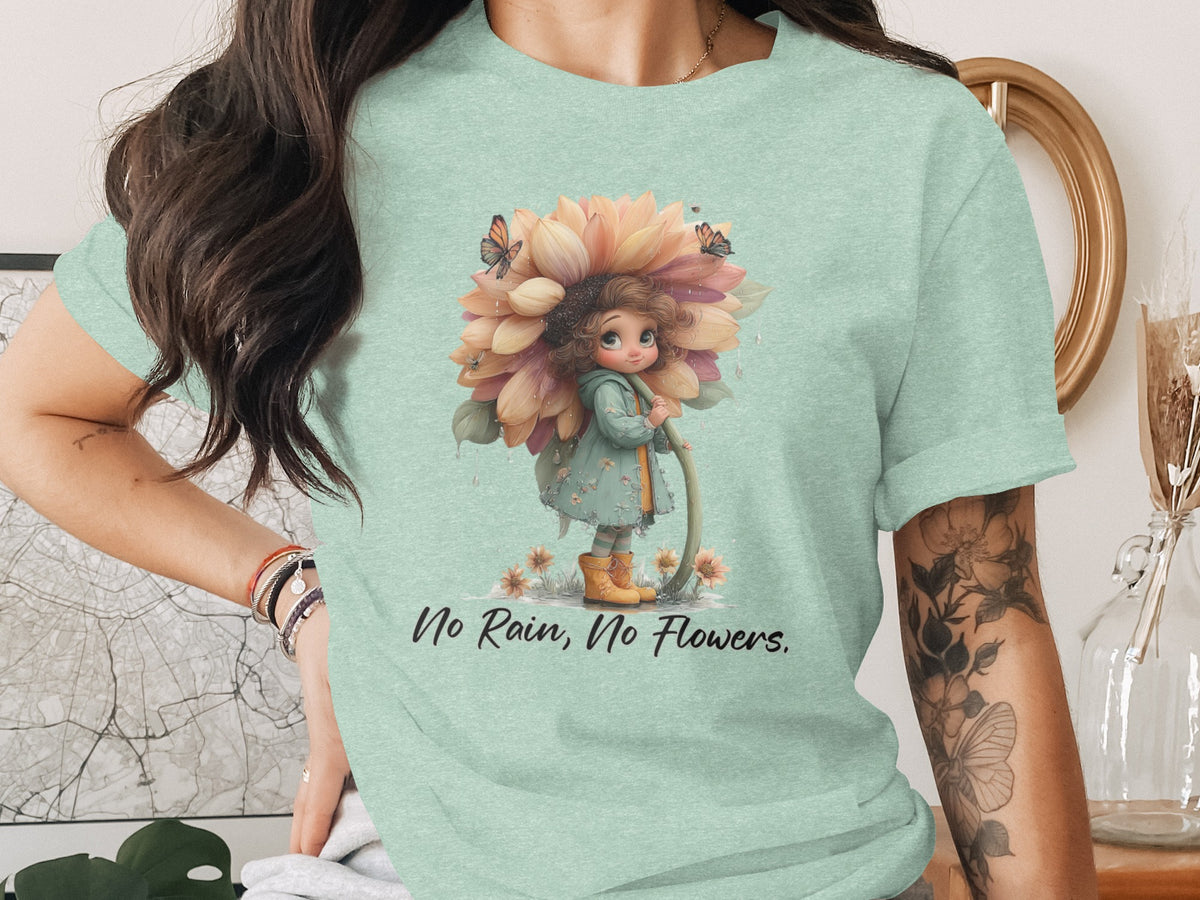 Mint t-shirt with illustration of girl holding flower, butterflies, and text "No Rain, No Flowers."