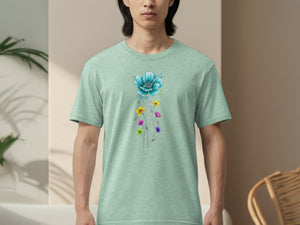 Light green t-shirt with a large blue flower and smaller colorful flowers with "mama" text.