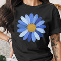 Black t-shirt with blue and yellow painted daisy graphic.