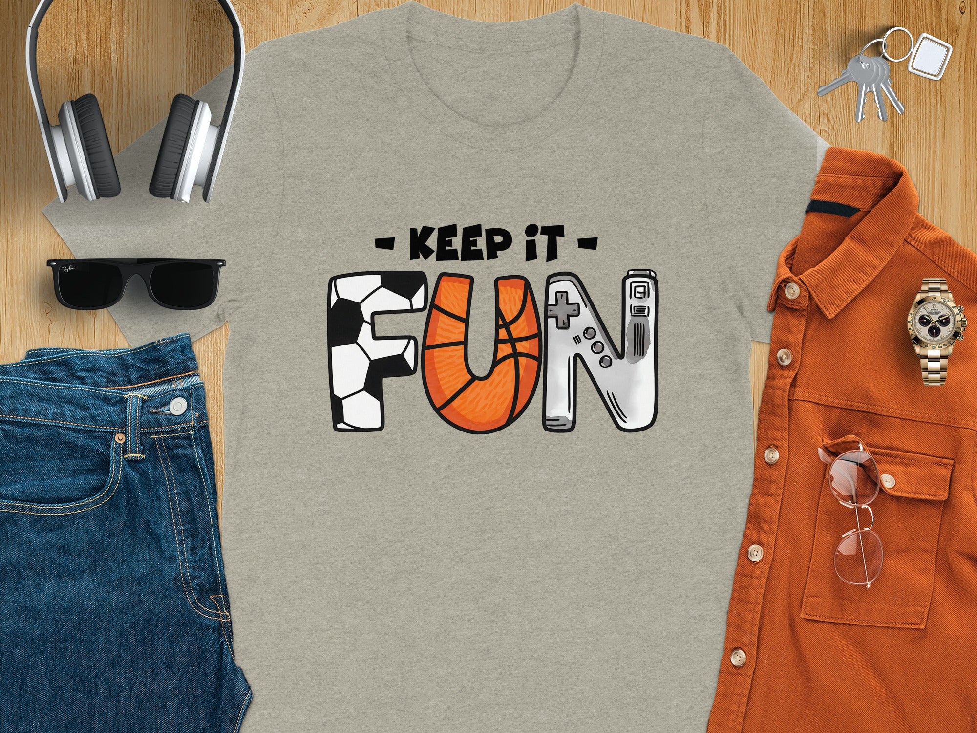 Grey t-shirt with "KEEP IT FUN" text and athletic graphics.