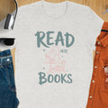 Light gray t-shirt with "READ MORE BOOKS" text and a duck reading a book graphic.