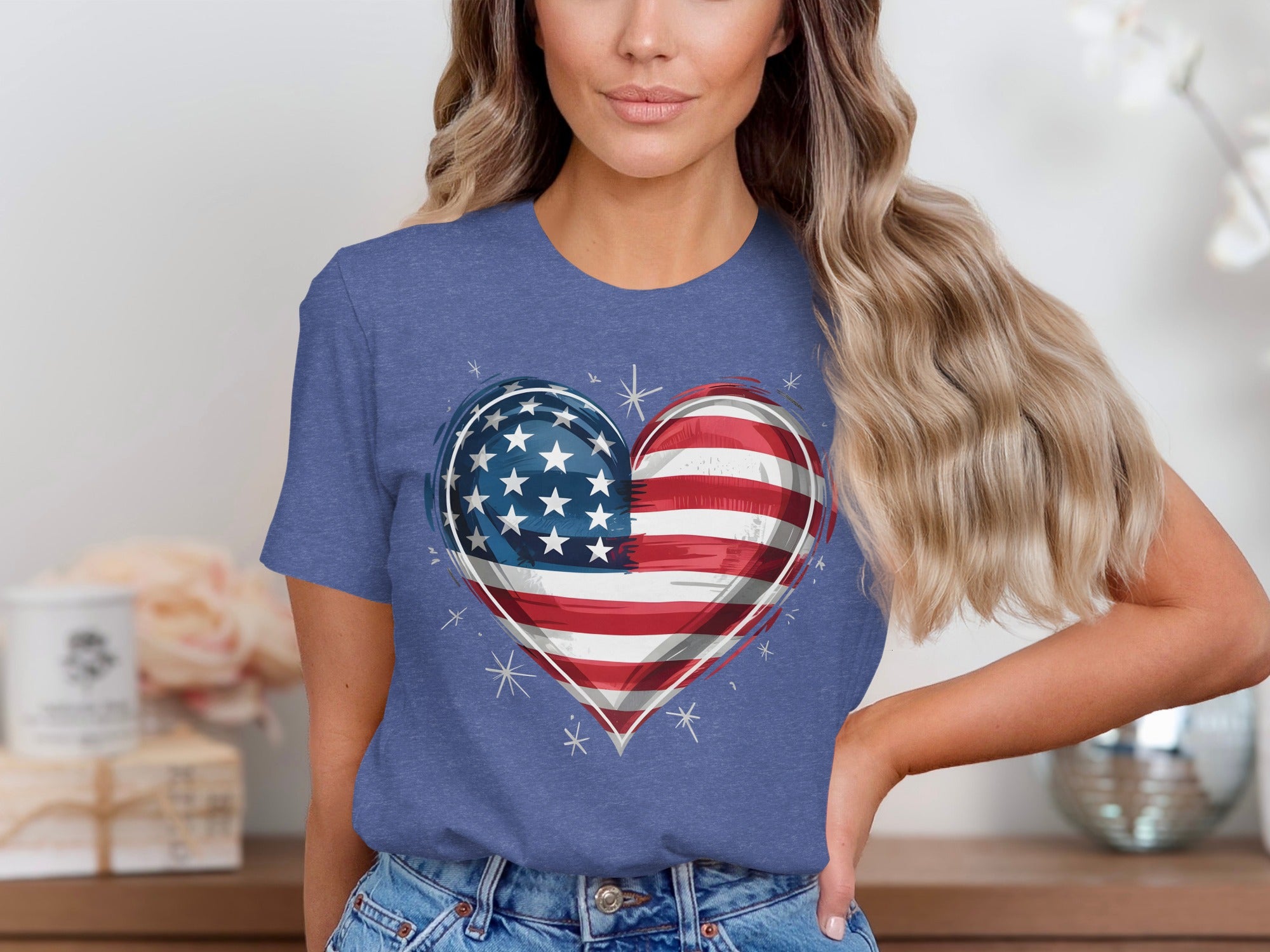 Blue t-shirt with a heart graphic of the American flag.