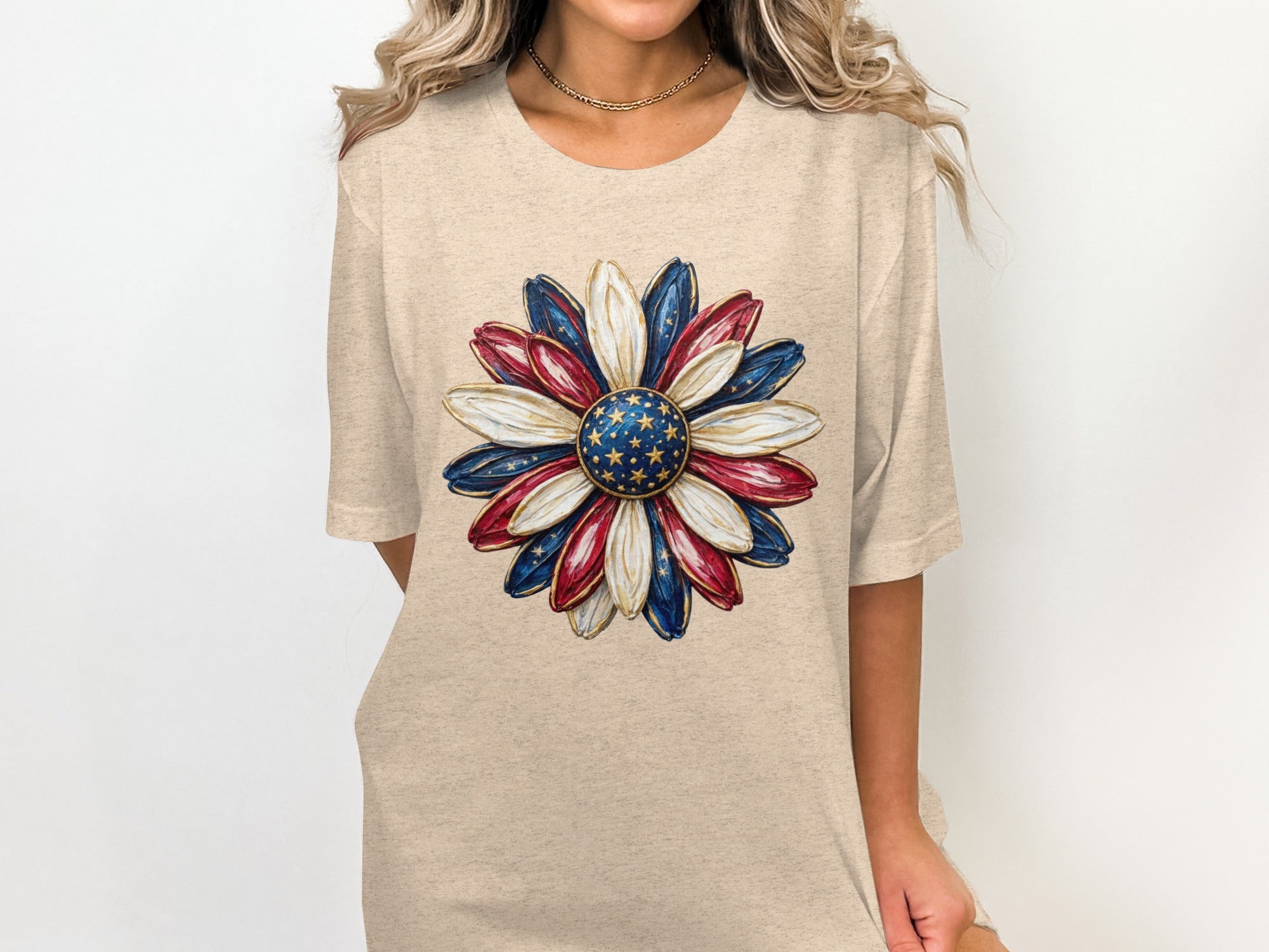 Beige t-shirt with a red, white, and blue floral print resembling an American flag.