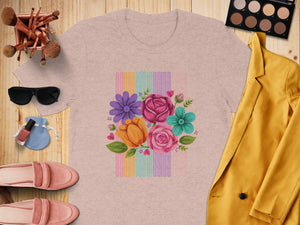 Pink t-shirt with colorful floral bouquet and striped background design.