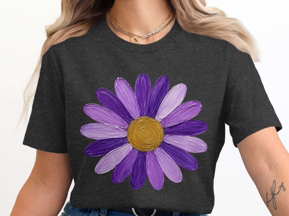 Dark gray t-shirt with a large purple daisy graphic and gold center.
