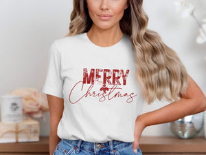 White t-shirt with red distressed "Merry Christmas" graphic and holly detail.