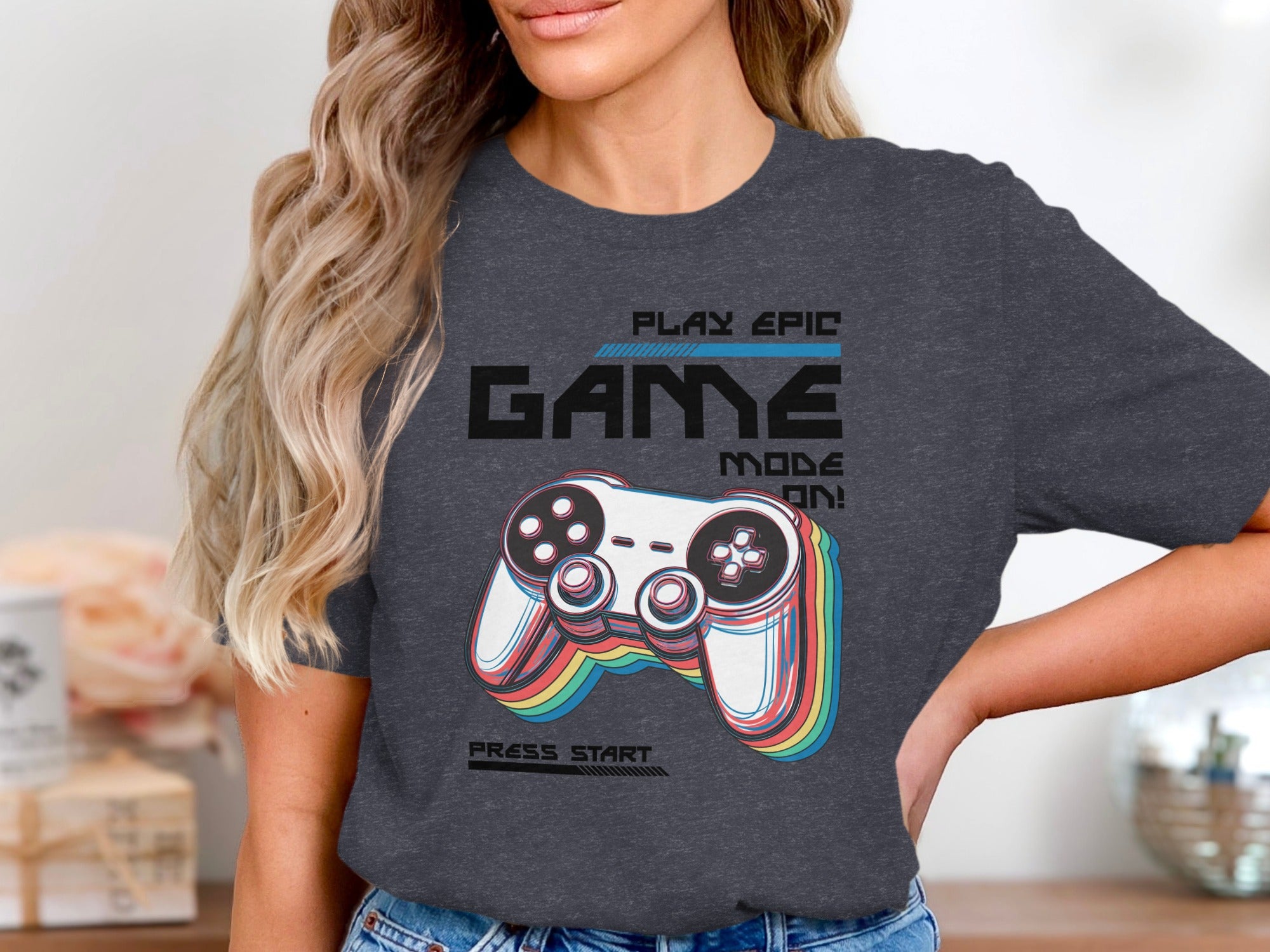 T-shirt with "Play Epic Game Mode On" and retro video game controller graphic.
