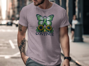 T-shirt with butterfly ribbon, sunflowers, and "CONTINUE" text.
