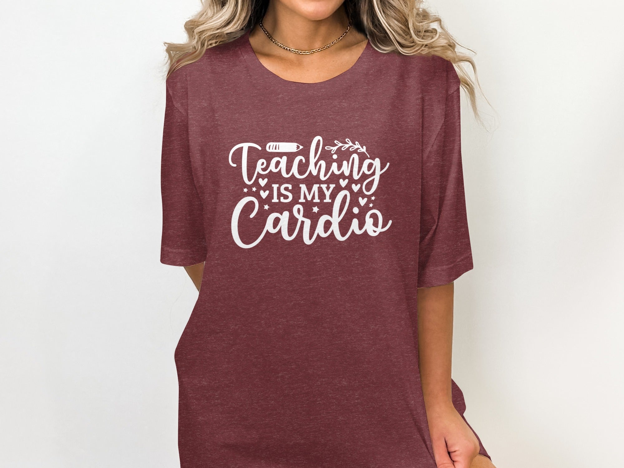 Maroon t-shirt with white text that reads "Teaching is my Cardio".
