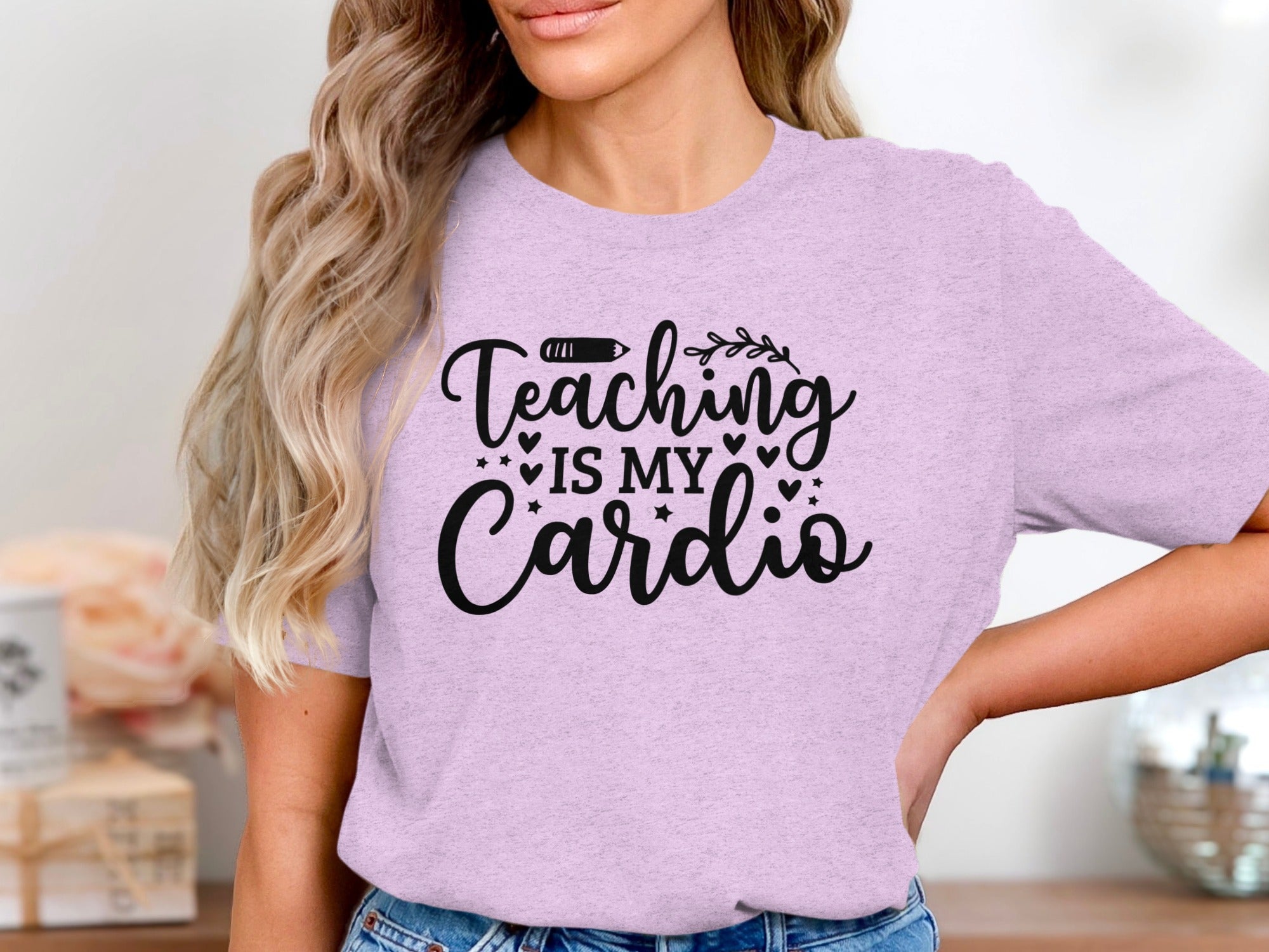 Lilac t-shirt with black text that reads "Teaching IS MY Cardio".