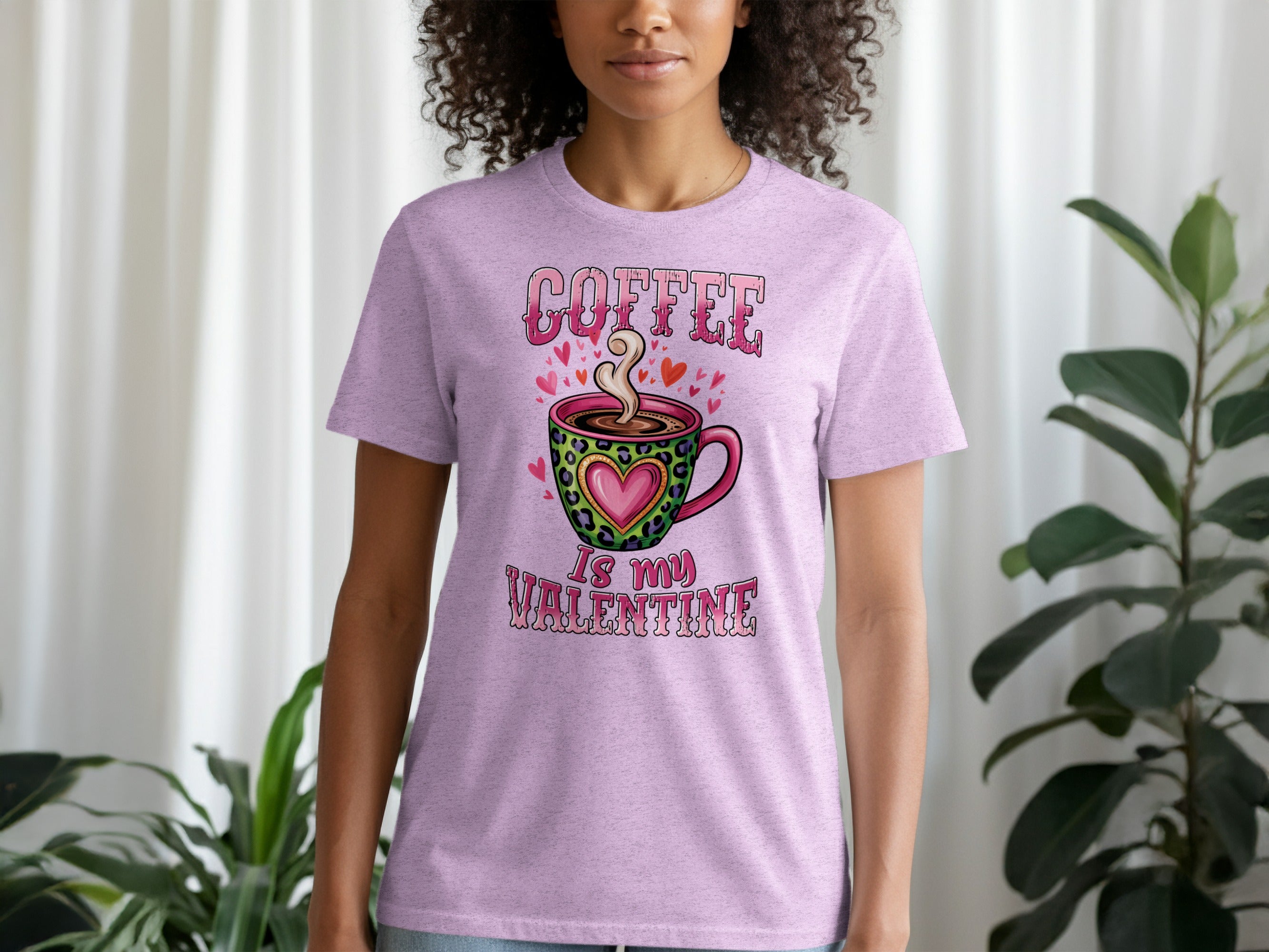 Lilac t-shirt with "Coffee is my Valentine" text and coffee cup graphic.