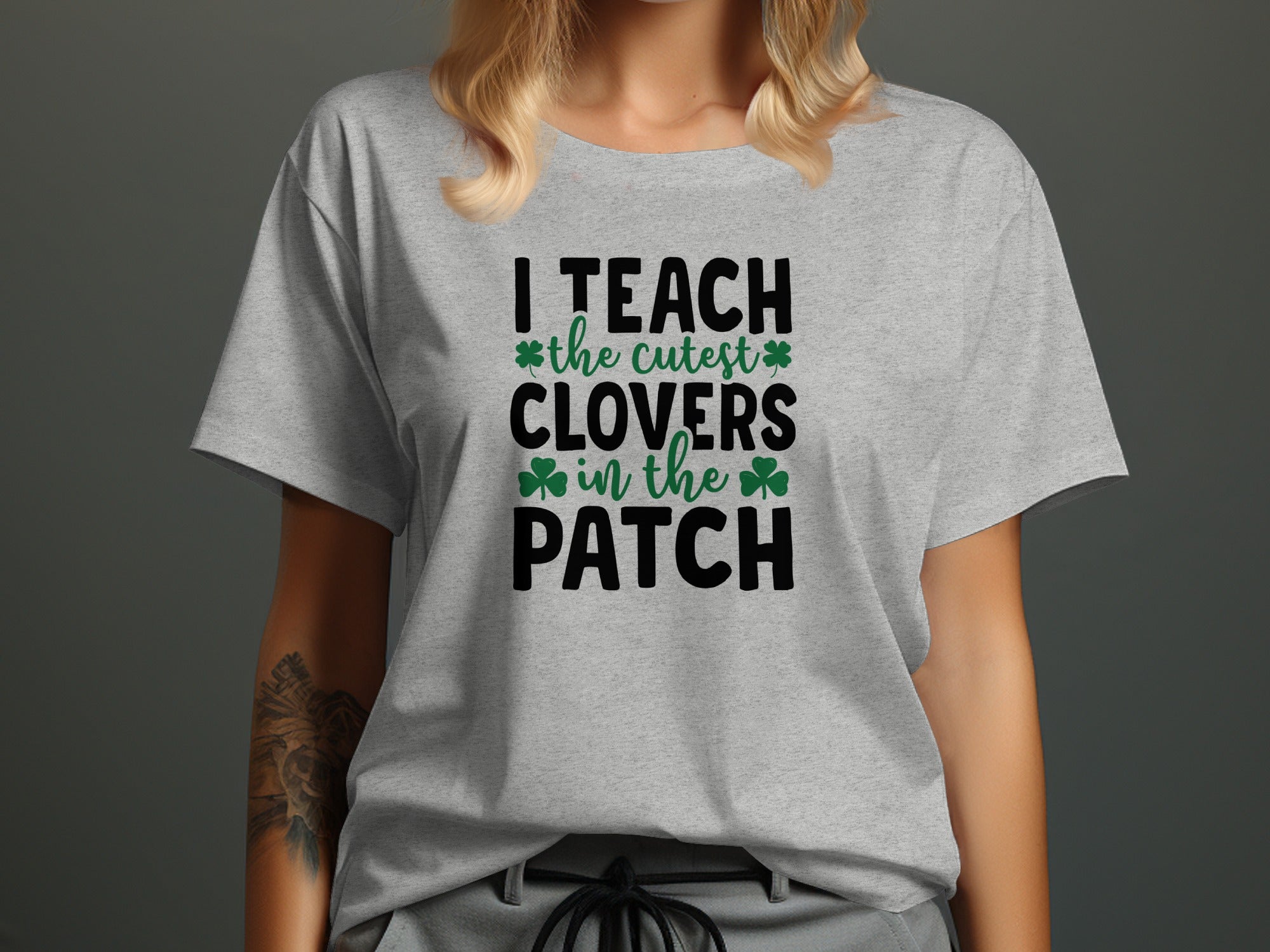 Grey t-shirt with St. Patrick's Day text "I teach the cutest clovers in the patch".