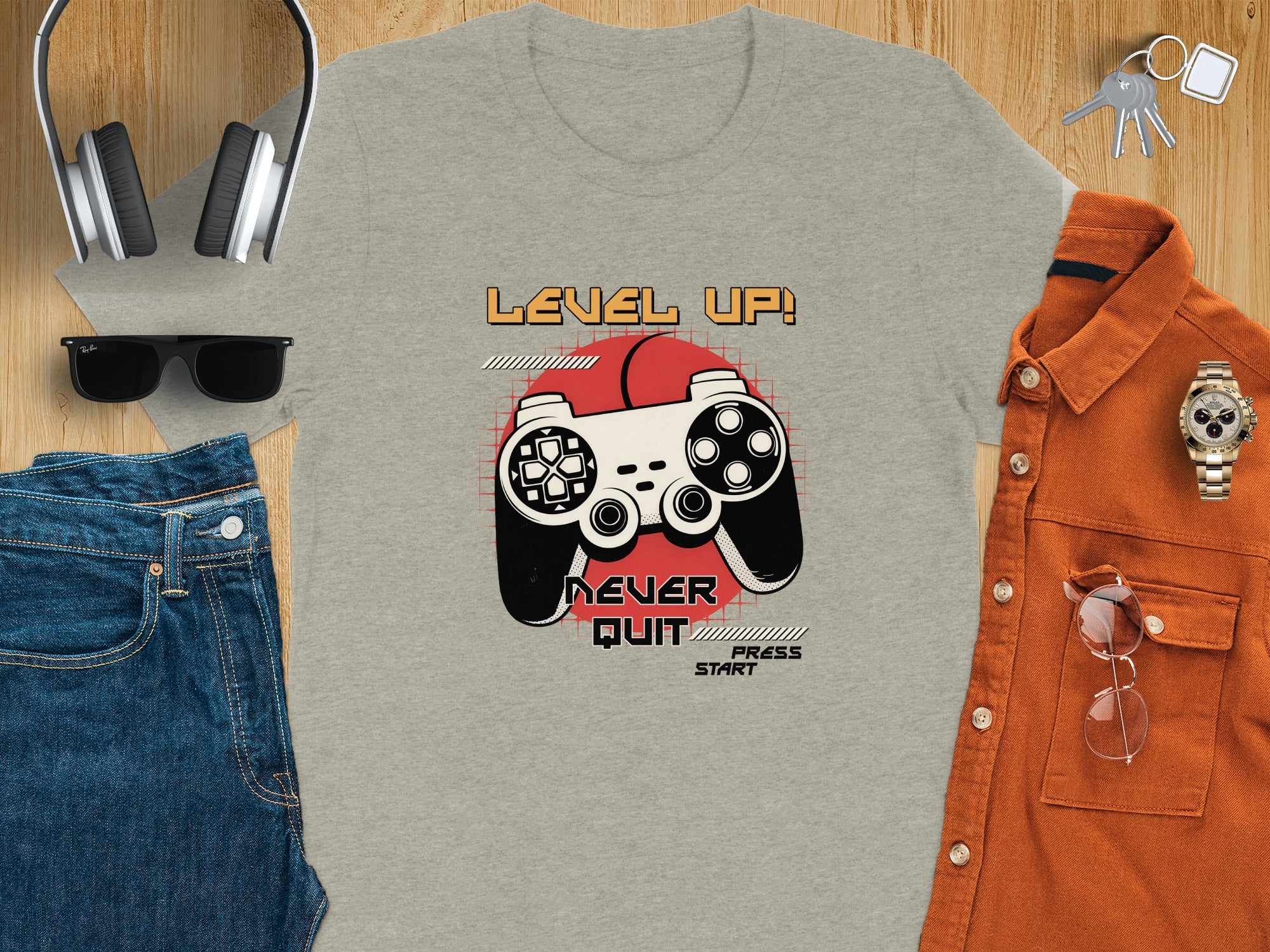 Gray t-shirt with graphic of video game controller and text "Level Up!"