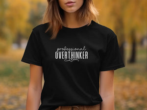 Black t-shirt with "professional OVERTHINKER" text and a heart design.