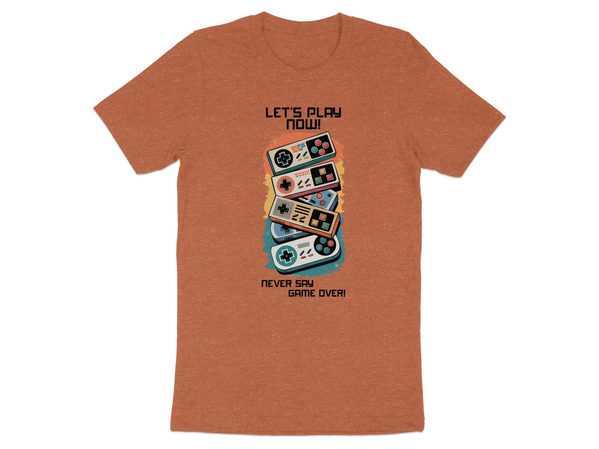 Orange t-shirt with retro video game controllers and text "Let's Play Now!" and "Never Say Game Over!".