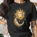 Black t-shirt featuring a sun and crescent moon celestial design.