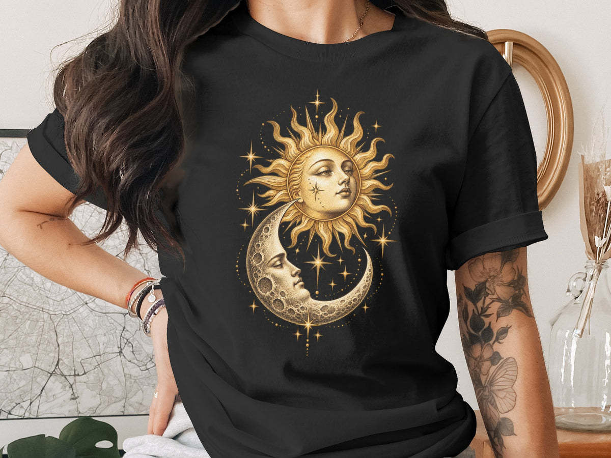 Black t-shirt featuring a sun and crescent moon celestial design.