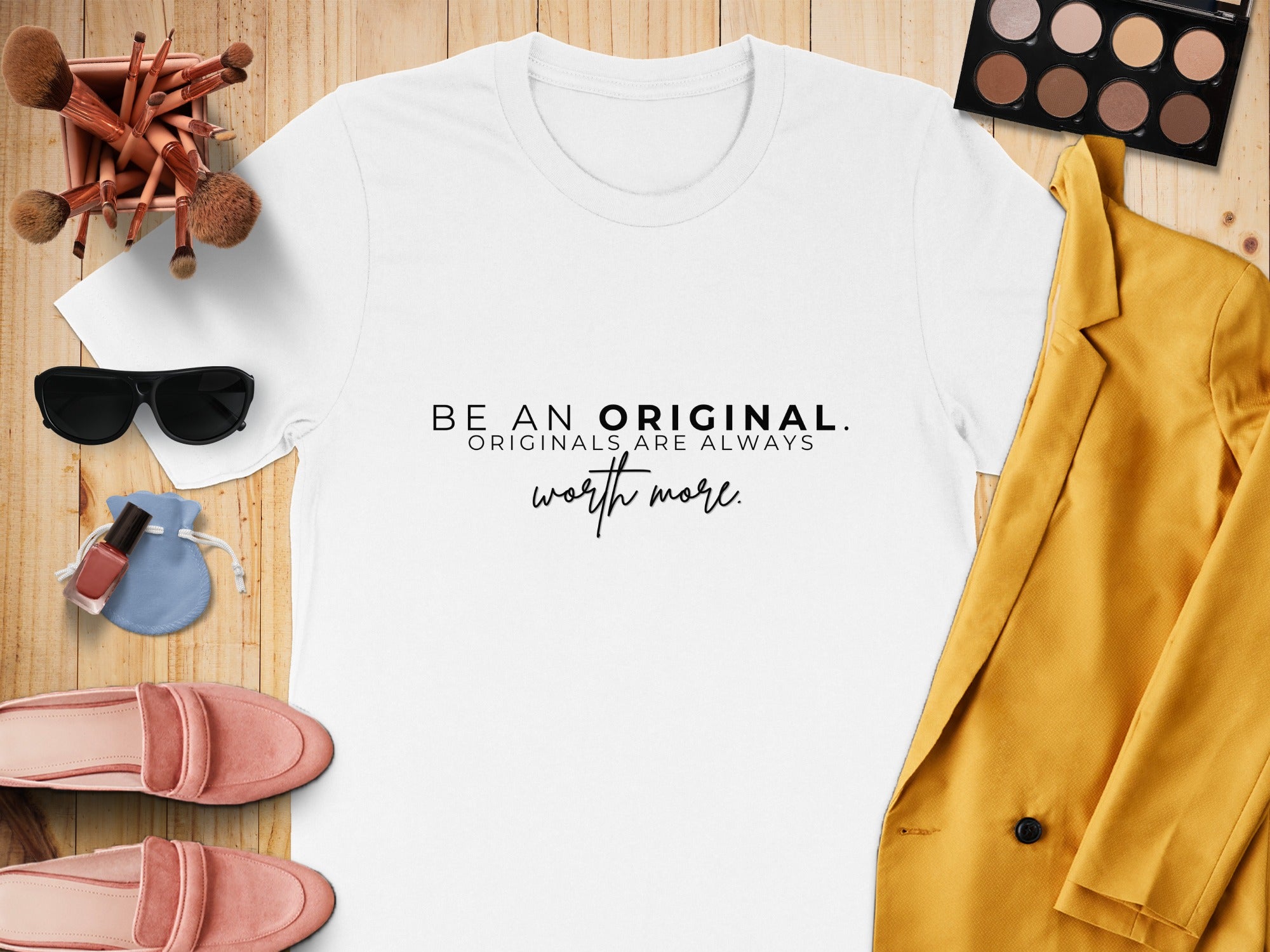 White t-shirt with black text "BE AN ORIGINAL. ORIGINALS ARE ALWAYS worth more."