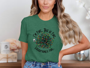 Green t-shirt with tangled Christmas lights and "I'm fine. This is fine. Everything's fine." text.