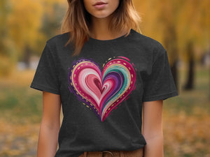 Charcoal t-shirt featuring a colorful abstract heart with gold accents.