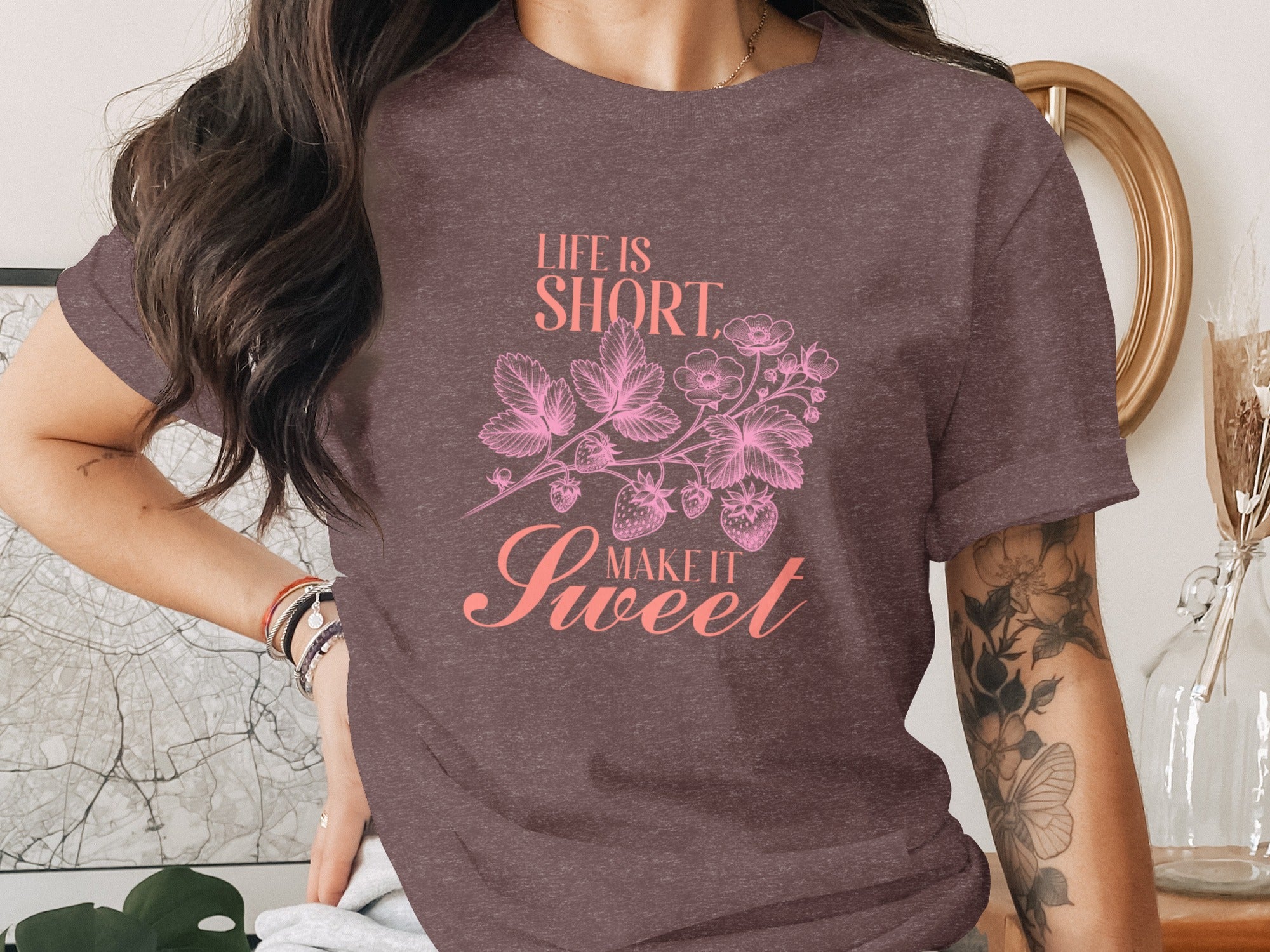 T-shirt with "Life is short make it sweet" text and strawberry illustration.