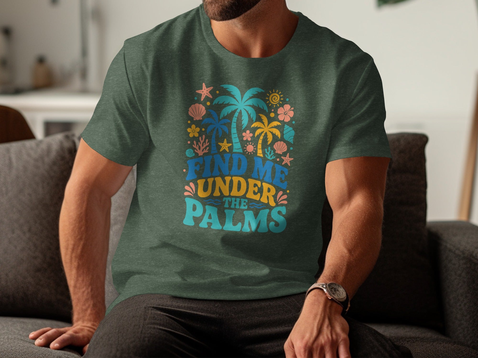 Green t-shirt with "Find Me Under the Palms" text and tropical graphic.