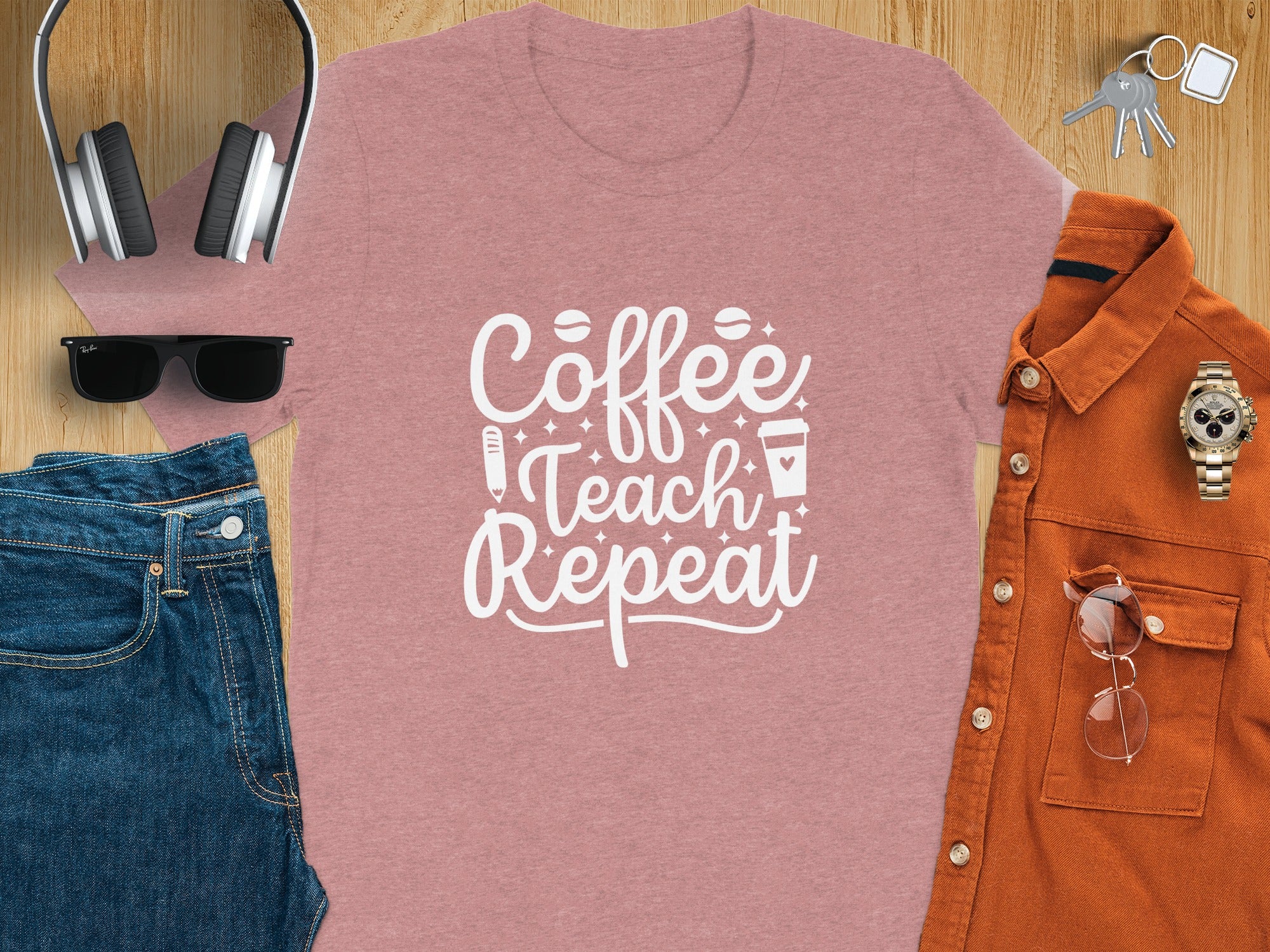 Pink t-shirt with "Coffee Teach Repeat" text and coffee cup graphic.