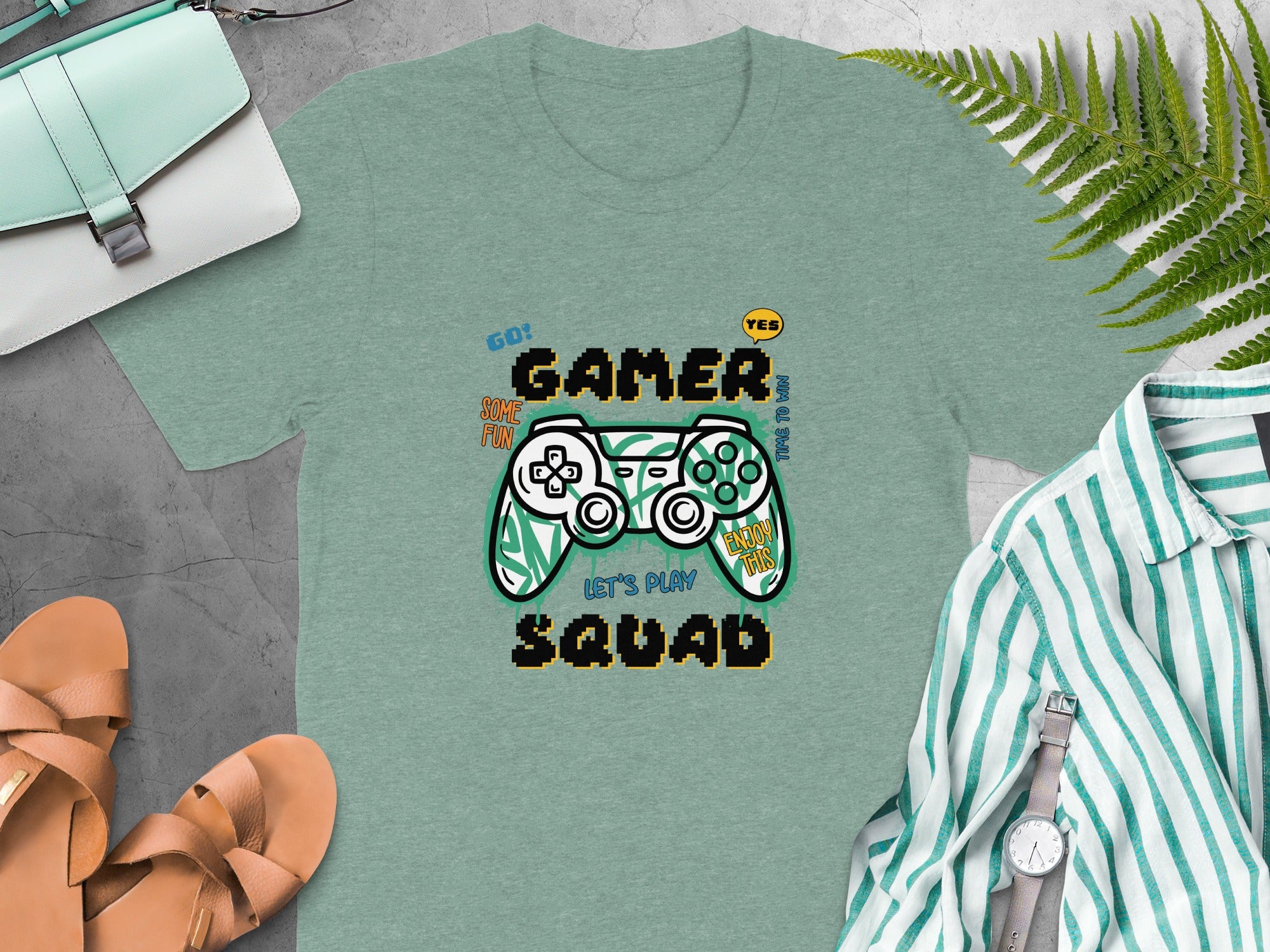 Green t-shirt with "Gamer Squad" and pixelated controller graphic.