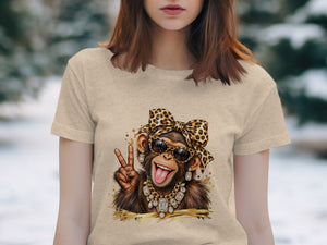 Monkey with leopard bow, sunglasses, jewelry, and peace sign on shirt.
