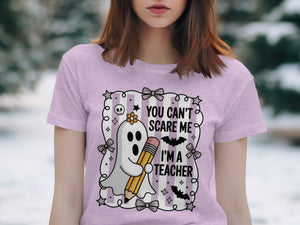 Ghost holding pencil with text "YOU CAN'T SCARE ME I'M A TEACHER".