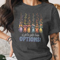 Dark grey t-shirt with floral brooms and text "A girl's gotta have OPTIONS!".
