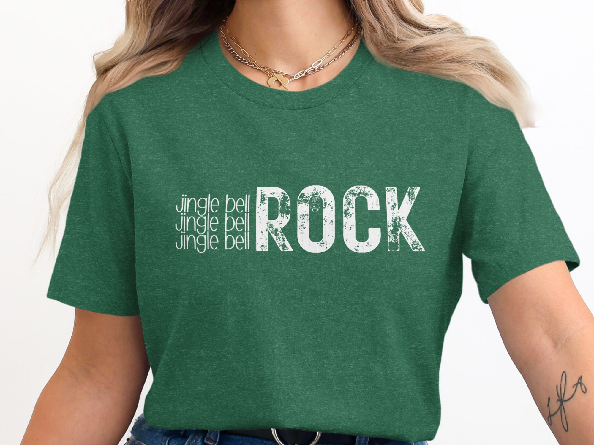 Green t-shirt with white text: "Jingle bell jingle bell jingle bell ROCK"