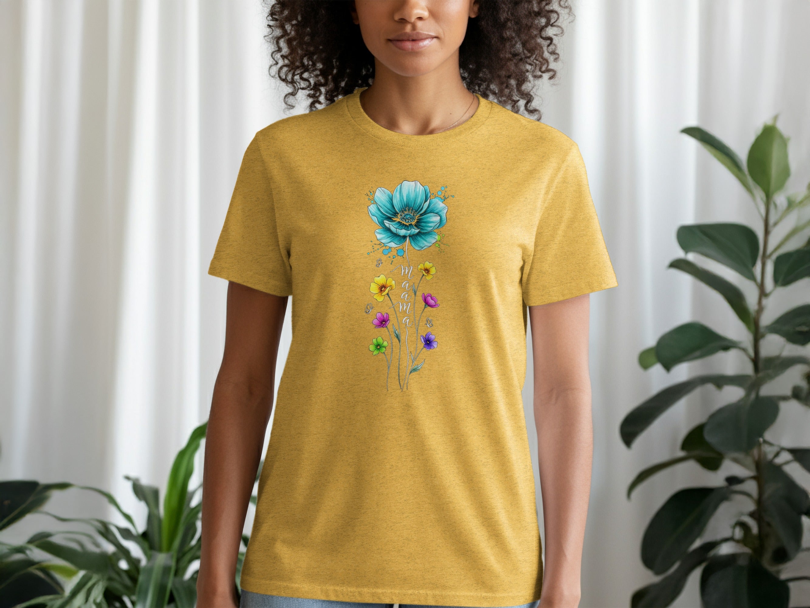 Yellow t-shirt with a watercolor floral design featuring the word "mama".