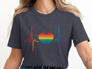 Dark gray t-shirt with rainbow heartbeat and heart graphic.