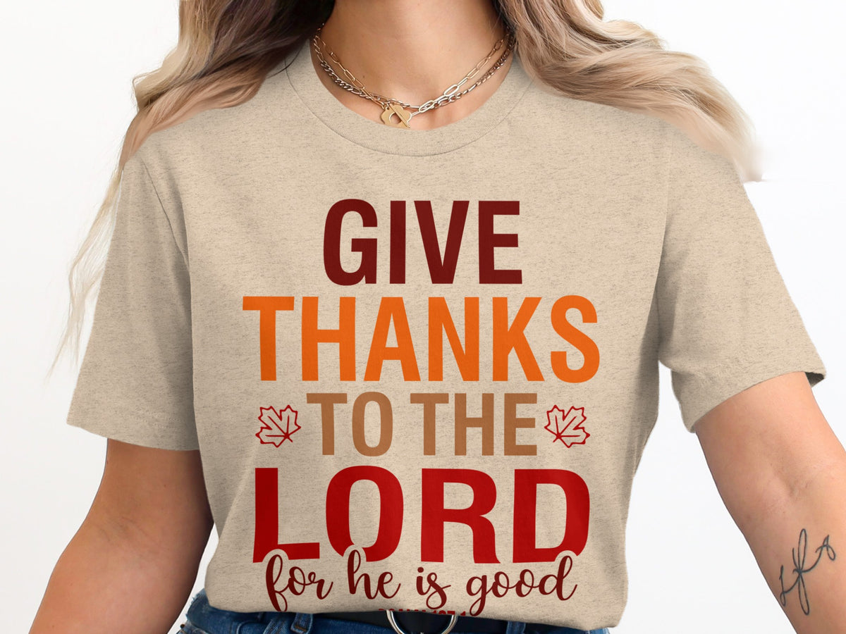 Light beige t-shirt with text "GIVE THANKS TO THE LORD for he is good"